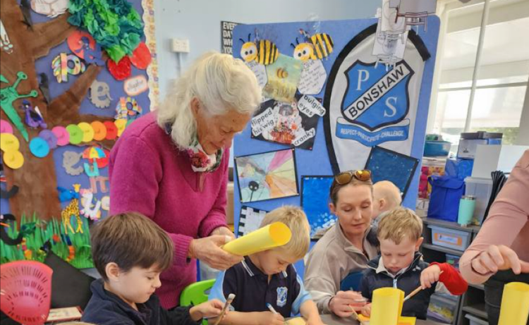 Families working with students in the classroom